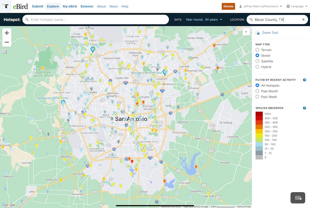 The markers on the map indicate birding hotspots colored by volume of species reported
