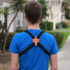 rear view of man wearing a binocular harness
