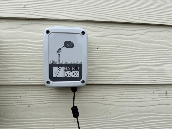 My Haikubox is mounted on the wall next to a BirdNET-Pi station.