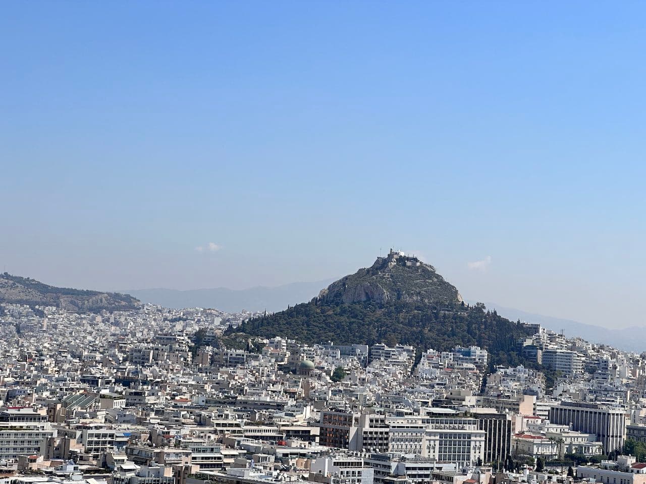 A view of Lycabettus Hill and downtown Athens from atop the Acropolis