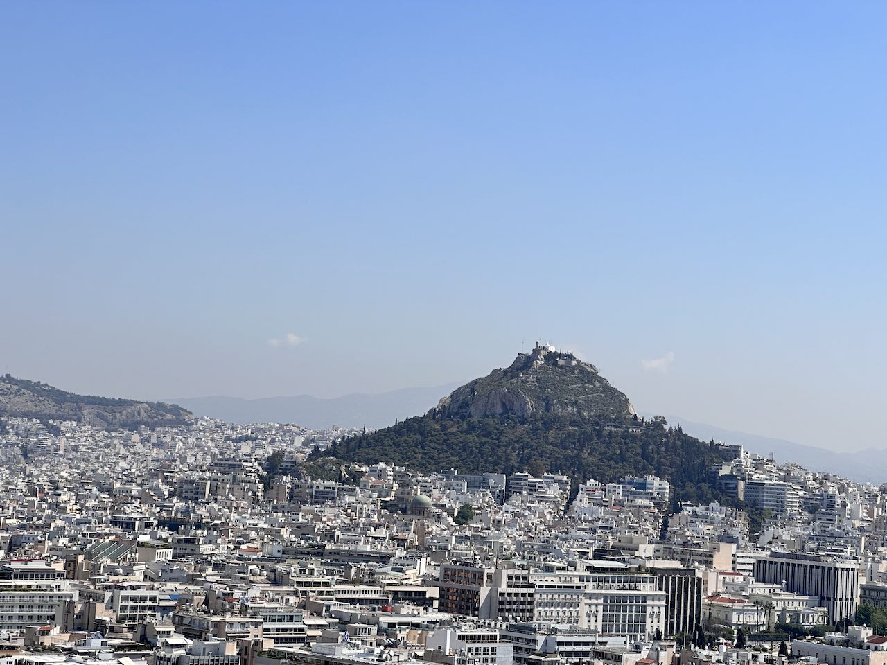 A view of Lycabettus Hill and downtown Athens from atop the Acropolis
