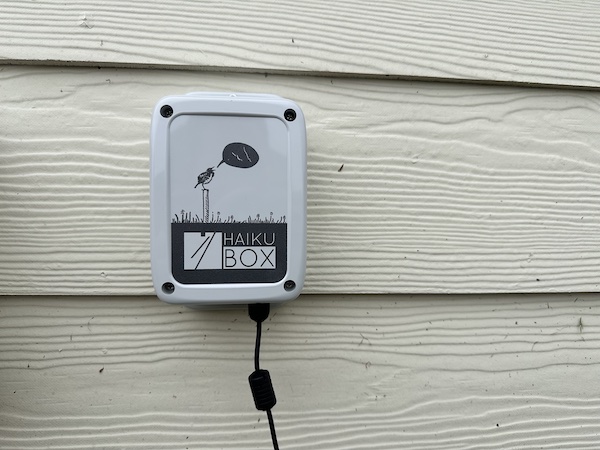 haikubox bioacoustic monitoring station mounted on outdoor wall