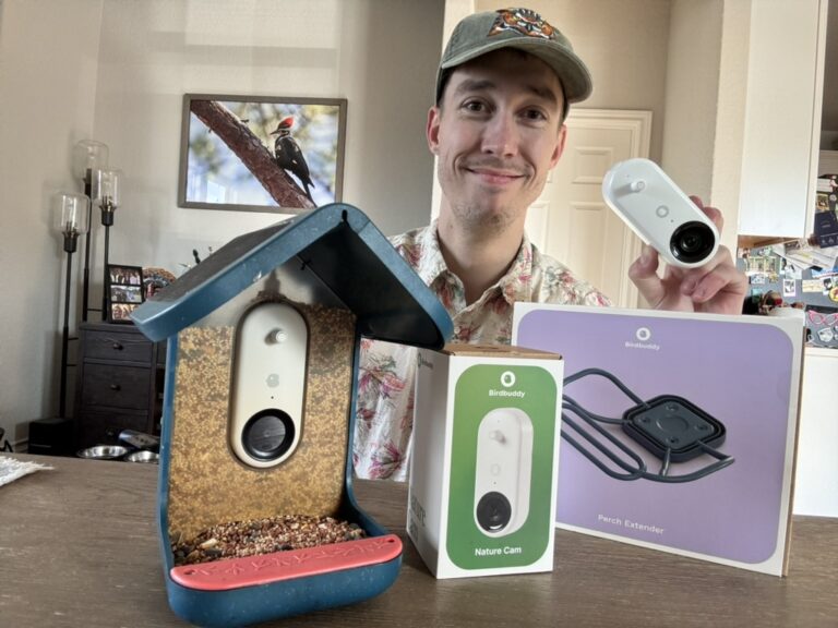 jeff with bird buddy pro smart feeder at table holding module