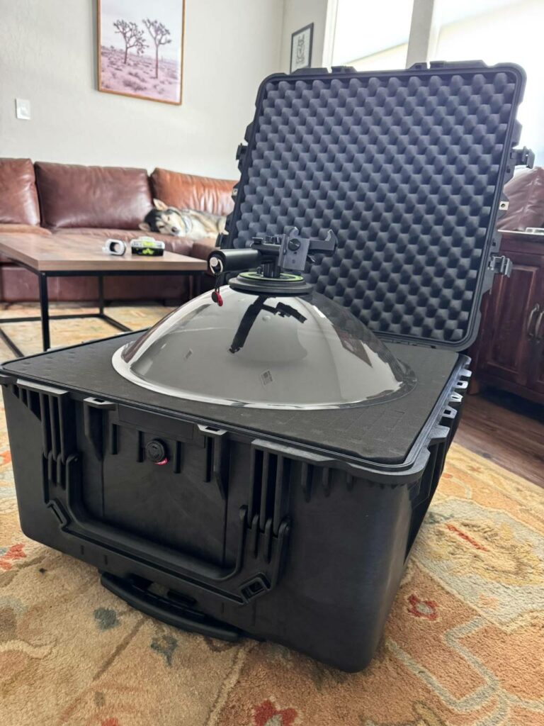 wildtronics pro mono parabolic mic sitting on the foam of a pelican case