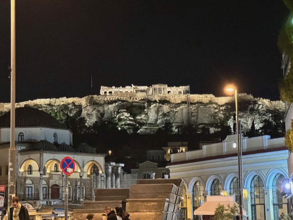 acropolis at night from streets below